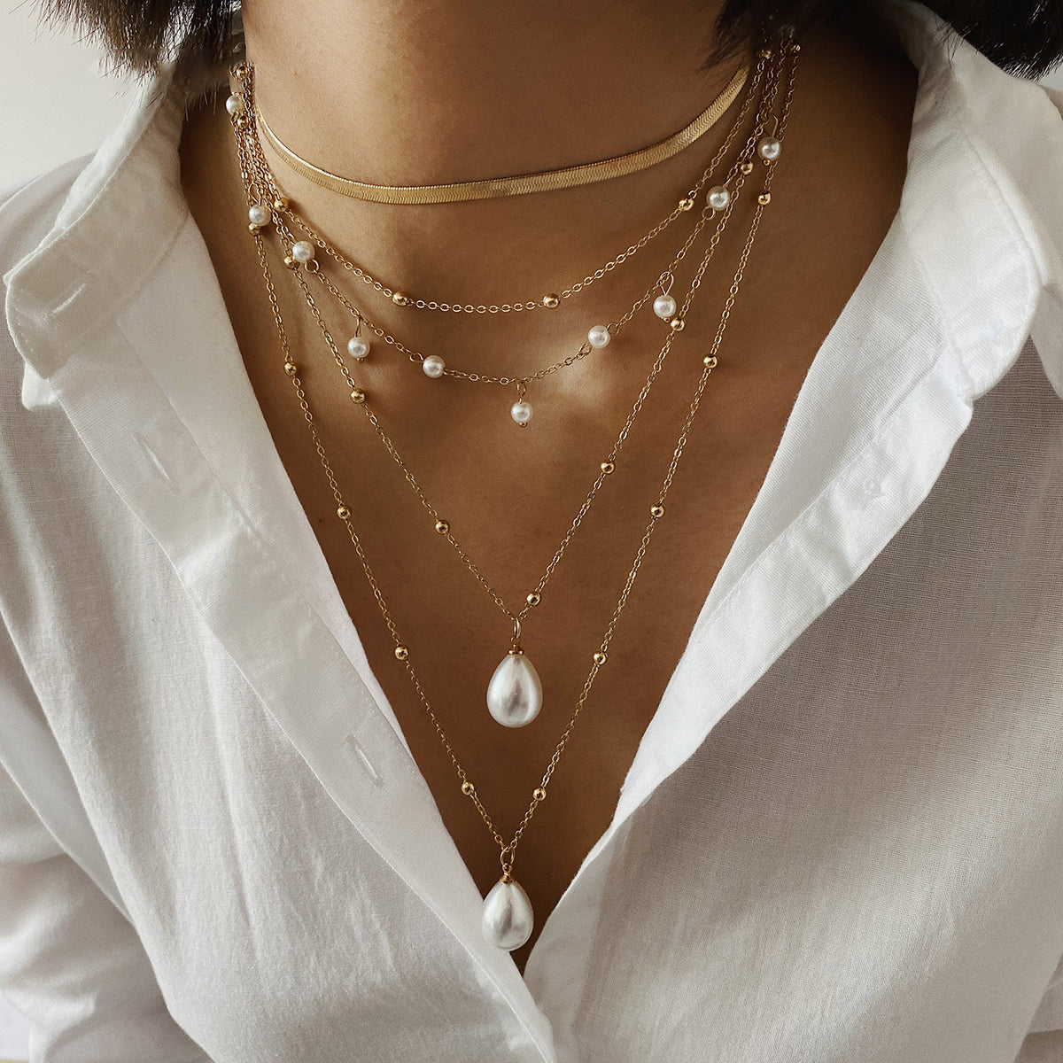 Multi-element pearl necklace